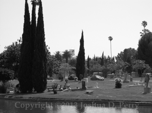 Random photo in Hollywood Forever Cemetery w/the Paramount Studios water tower in the background. This photo is from my collection.